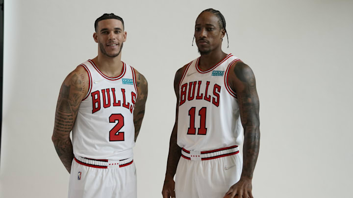 Sep 27, 2021; Chicago, Illinois, USA; Chicago Bulls  forward DeMar DeRozan (11) and guard Lonzo Ball (2) pose for photos during Chicago Bulls Media Day at the United Center. Mandatory Credit: David Banks-Imagn Images