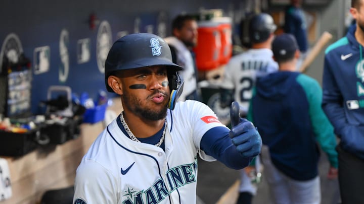 Seattle Mariners center fielder Julio Rodriguez (44) celebrates in the dugout after scoring a run against the New York Yankees during the fourth inning at T-Mobile Park on May 13. Seattle Mariners center fielder Julio Rodriguez (44) celebrates in the dugout after scoring a run against the New York Yankees during the fourth inning at T-Mobile Park on May 13.