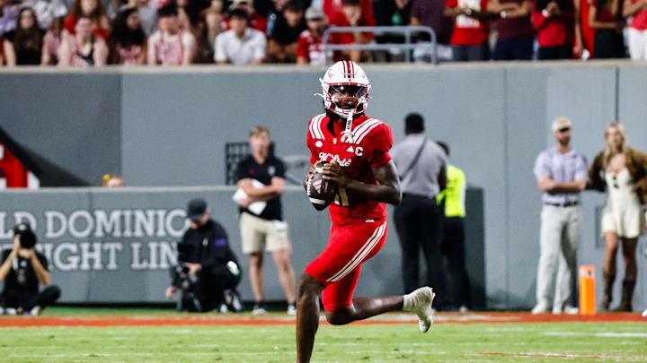 Aug 28, 2025; Raleigh, North Carolina, USA; North Carolina State Wolfpack quarterback CJ Bailey (11) runs with the ball during the second half of the game against East Carolina Pirates at Carter-Finley Stadium. Mandatory Credit: Jaylynn Nash-Imagn Images Aug 28, 2025; Raleigh, North Carolina, USA; North Carolina State Wolfpack quarterback CJ Bailey (11) runs with the ball during the second half of the game against East Carolina Pirates at Carter-Finley Stadium. Mandatory Credit: Jaylynn Nash-Imagn Images