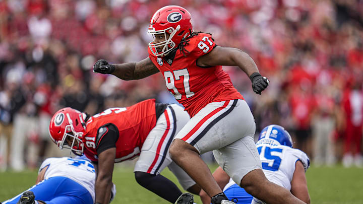 Oct 4, 2025; Athens, Georgia, USA; Georgia Bulldogs defensive lineman Jordan Thomas (97) fights off blocks to rush the Kentucky Wildcats quarterback at Sanford Stadium. Mandatory Credit: Dale Zanine-Imagn Images Oct 4, 2025; Athens, Georgia, USA; Georgia Bulldogs defensive lineman Jordan Thomas (97) fights off blocks to rush the Kentucky Wildcats quarterback at Sanford Stadium. Mandatory Credit: Dale Zanine-Imagn Images