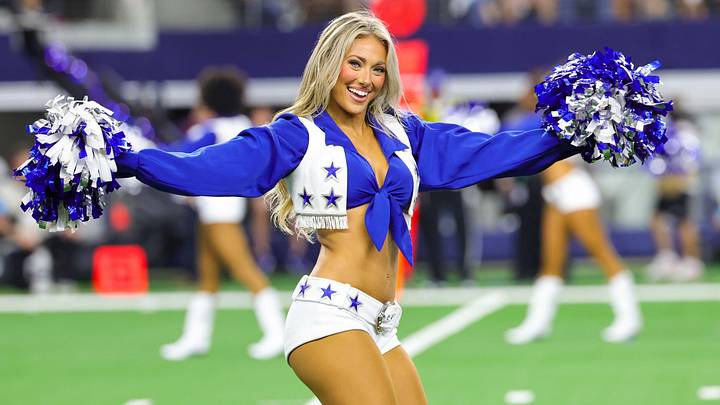 Dallas Cowboys cheerleader performs during the game against the Washington Commanders at AT&T Stadium. 
