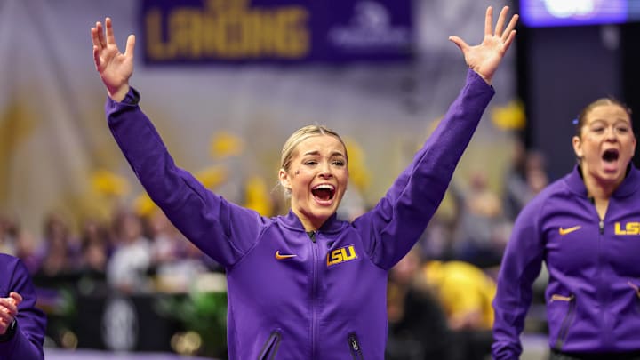 LSU s Livvy Dunne celebrates her teammates vault during the Missouri Tigers and the LSU Tigers. LSU s Livvy Dunne celebrates her teammates vault during the Missouri Tigers and the LSU Tigers.