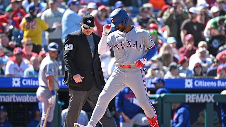 Mar 29, 2026; Philadelphia, Pennsylvania, USA; Texas Rangers center fielder Andrew McCutchen (4) steps on home plate after hitting a three run home run against the Philadelphia Phillies during the third inning at Citizens Bank Park. Mandatory Credit: Eric Hartline-Imagn Images Mar 29, 2026; Philadelphia, Pennsylvania, USA; Texas Rangers center fielder Andrew McCutchen (4) steps on home plate after hitting a three run home run against the Philadelphia Phillies during the third inning at Citizens Bank Park. Mandatory Credit: Eric Hartline-Imagn Images