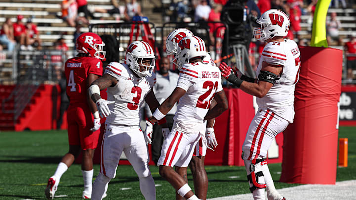 Oct 12, 2024; Piscataway, New Jersey, USA; Wisconsin Badgers running back Tawee Walker (3) celebrates after a rushing touchdown with teammates during the second half against the Rutgers Scarlet Knights at SHI Stadium. Mandatory Credit: Vincent Carchietta-Imagn Images