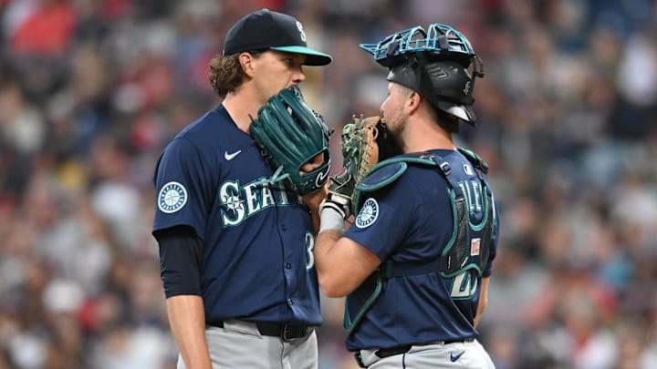 Aug 30, 2025; Cleveland, Ohio, USA; Seattle Mariners starting pitcher Logan Gilbert (36) talks to catcher Cal Raleigh (29) during the third inning against the Cleveland Guardians at Progressive Field. Mandatory Credit: Ken Blaze-Imagn Images