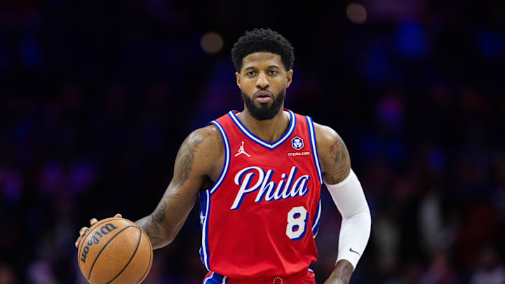 Jan 10, 2025; Philadelphia, Pennsylvania, USA; Philadelphia 76ers forward Paul George (8) dribbles the ball against the New Orleans Pelicans during the first quarter at Wells Fargo Center. Mandatory Credit: Bill Streicher-Imagn Images