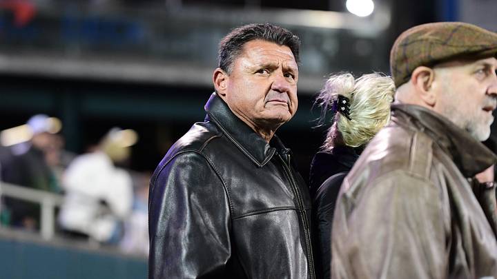 Nov 12, 2022; New Orleans, Louisiana, USA; LSU Tigers former head coach Ed Orgeron watches a game between the Tulane Green Wave and the UCF Knights from the sidelines at Yulman Stadium. Mandatory Credit: Rebecca Warren-Imagn Images