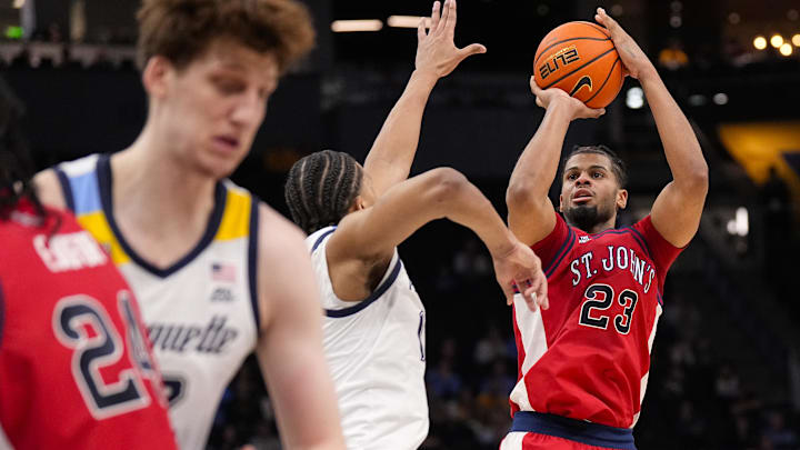 Feb 18, 2026; Milwaukee, Wisconsin, USA; St. John’s basketball guard-forward Bryce Hopkins (23) shoots during the first half against the Marquette Golden Eagles at Fiserv Forum. Feb 18, 2026; Milwaukee, Wisconsin, USA; St. John’s basketball guard-forward Bryce Hopkins (23) shoots during the first half against the Marquette Golden Eagles at Fiserv Forum.
