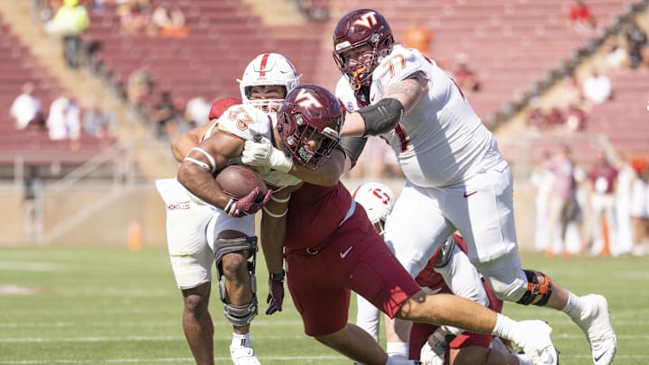 Oct 5, 2024; Stanford, California, USA; Virginia Tech Hokies running back Bhayshul Tuten (33) runs with the football against the Stanford Cardinal during the second quarter at Stanford Stadium. Mandatory Credit: Stan Szeto-Imagn Images Oct 5, 2024; Stanford, California, USA; Virginia Tech Hokies running back Bhayshul Tuten (33) runs with the football against the Stanford Cardinal during the second quarter at Stanford Stadium. Mandatory Credit: Stan Szeto-Imagn Images