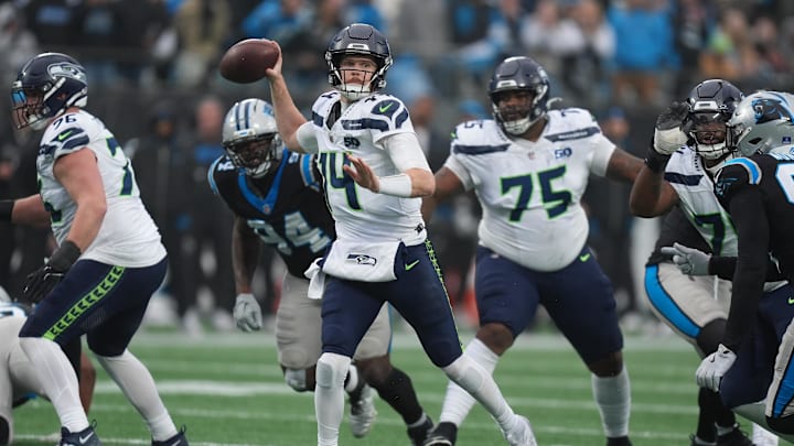 Dec 28, 2025; Charlotte, North Carolina, USA; Seattle Seahawks quarterback Sam Darnold (14) passes the ball against the Carolina Panthers during the second half at Bank of America Stadium. Mandatory Credit: Jim Dedmon-Imagn Images