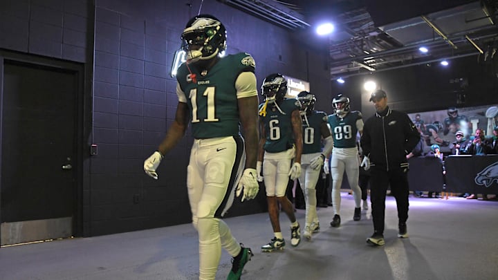 Jan 12, 2025; Philadelphia, Pennsylvania, USA; Philadelphia Eagles wide receiver A.J. Brown (11) and  wide receiver DeVonta Smith (6) walk to the field before game against the Green Bay Packers.