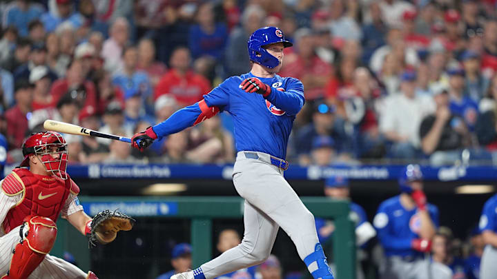 Jun 9, 2025; Philadelphia, Pennsylvania, USA; Chicago Cubs outfielder Pete Crow-Armstrong (4) hits an RBI double against the Philadelphia Phillies in the eleventh inning at Citizens Bank Park. 