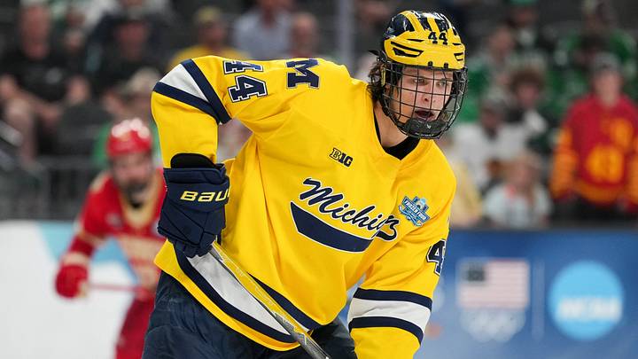 Apr 9, 2026; Las Vegas, Nevada, UNITED STATES; Michigan Wolverines forward Will Horcoff (44) tracks the puck in overtime against the Denver Pioneers in the semifinals of the NCAA men's ice hockey Frozen Four at T-Mobile Arena. Mandatory Credit: Lucas Peltier-Imagn Images