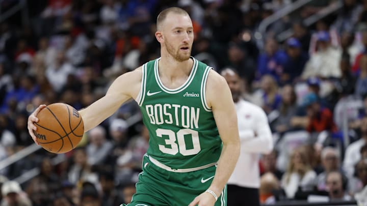 Oct 26, 2025; Detroit, Michigan, USA; Boston Celtics forward Sam Hauser (30) dribbles in the first half against the Detroit Pistons at Little Caesars Arena. Mandatory Credit: Rick Osentoski-Imagn Images