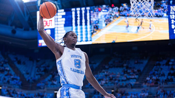 Nov 18, 2025; Chapel Hill, North Carolina, USA; North Carolina Tar Heels forward Caleb Wilson (8) goes up for a dunk against the Navy Midshipmen during the second half at Dean E. Smith Center. Nov 18, 2025; Chapel Hill, North Carolina, USA; North Carolina Tar Heels forward Caleb Wilson (8) goes up for a dunk against the Navy Midshipmen during the second half at Dean E. Smith Center.