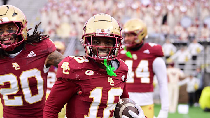 Nov 23, 2024; Chestnut Hill, Massachusetts, USA;  Boston College Eagles cornerback Ryan Turner (18) reacts to his pick-six during the second half against the North Carolina Tar Heels at Alumni Stadium. Mandatory Credit: Eric Canha-Imagn Images