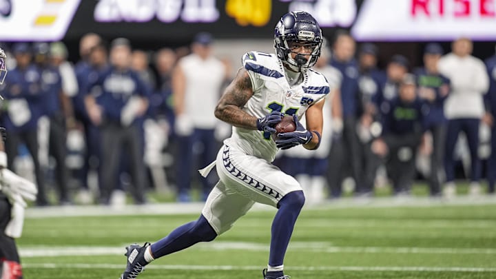 Dec 7, 2025; Atlanta, Georgia, USA; Seattle Seahawks wide receiver Jaxon Smith-Njigba (11) runs for a touchdown against the Atlanta Falcons during the second half at Mercedes-Benz Stadium. Mandatory Credit: Dale Zanine-Imagn Images