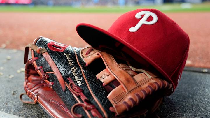 Jun 8, 2026; Toronto, Ontario, CAN; The glove and hat of Philadelphia Phillies center fielder Justin Crawford (2) in the dugout during a game against the Toronto Blue Jays at Rogers Centre. Mandatory Credit: John E. Sokolowski-Imagn Images