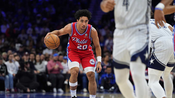 Dec 6, 2024; Philadelphia, Pennsylvania, USA; Philadelphia 76ers guard Jared McCain (20) controls the ball against the Orlando Magic in the fourth quarter at Wells Fargo Center. Mandatory Credit: Kyle Ross-Imagn Images