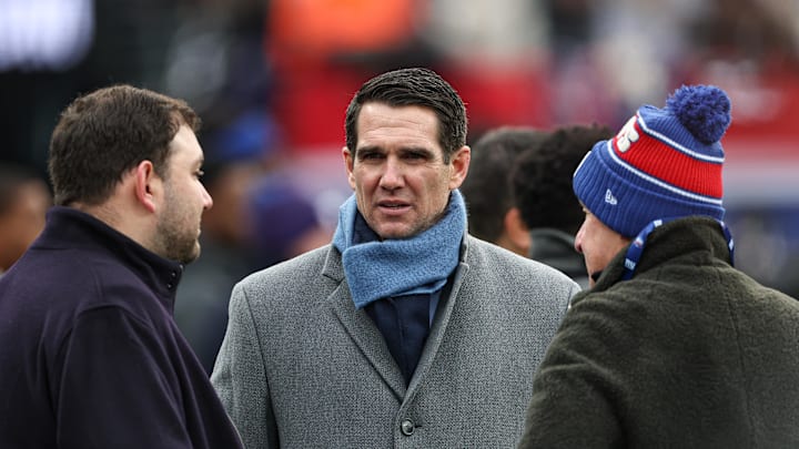 Dec 15, 2024; East Rutherford, New Jersey, USA; New York Giants general manager Joe Schoen, center, on the field before the game against the Baltimore Ravens at MetLife Stadium. Dec 15, 2024; East Rutherford, New Jersey, USA; New York Giants general manager Joe Schoen, center, on the field before the game against the Baltimore Ravens at MetLife Stadium.
