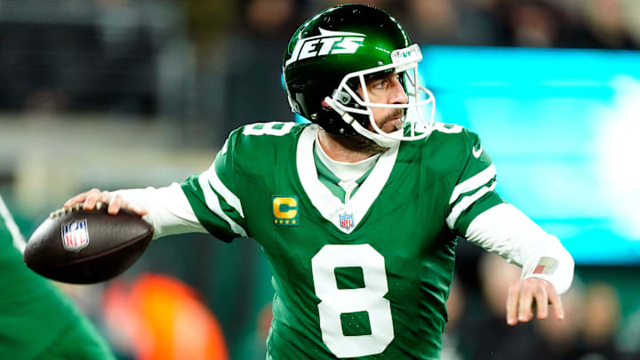 New York Jets quarterback Aaron Rodgers throws a pass.
