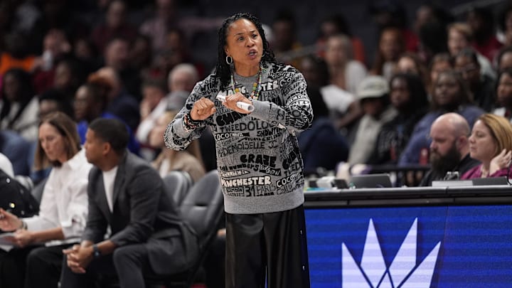 Nov 10, 2024; Charlotte, NC, USA; South Carolina Gamecocks head coach Dawn Staley reads to a call during the first half against the NC State Wolfpack at the Ally Tip Off at Spectrum Center. Mandatory Credit: Jim Dedmon-Imagn Images Nov 10, 2024; Charlotte, NC, USA; South Carolina Gamecocks head coach Dawn Staley reads to a call during the first half against the NC State Wolfpack at the Ally Tip Off at Spectrum Center. Mandatory Credit: Jim Dedmon-Imagn Images