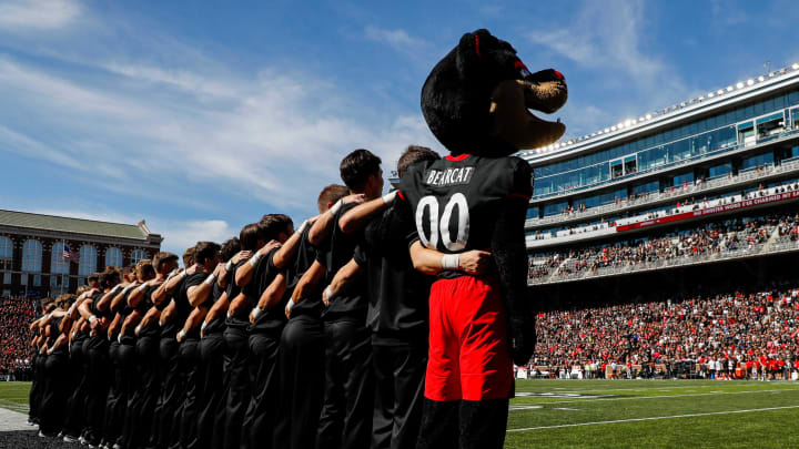 Sep 23, 2023; Cincinnati, Ohio, USA; The Cincinnati Bearcats mascot stands on the field during the playing of the Alma Mater prior to the game against the Oklahoma Sooners at Nippert Stadium. Mandatory Credit: Katie Stratman-USA TODAY Sports Sep 23, 2023; Cincinnati, Ohio, USA; The Cincinnati Bearcats mascot stands on the field during the playing of the Alma Mater prior to the game against the Oklahoma Sooners at Nippert Stadium. Mandatory Credit: Katie Stratman-USA TODAY Sports