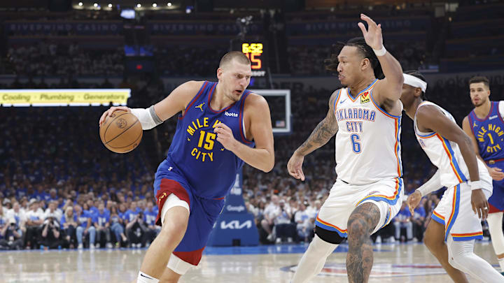 May 13, 2025; Oklahoma City, Oklahoma, USA; Denver Nuggets center Nikola Jokic (15) drives to the basket against Oklahoma City Thunder forward Jaylin Williams (6) during the second quarter of game five of the second round for the 2025 NBA Playoffs at Paycom Center. Mandatory Credit: Alonzo Adams-Imagn Images