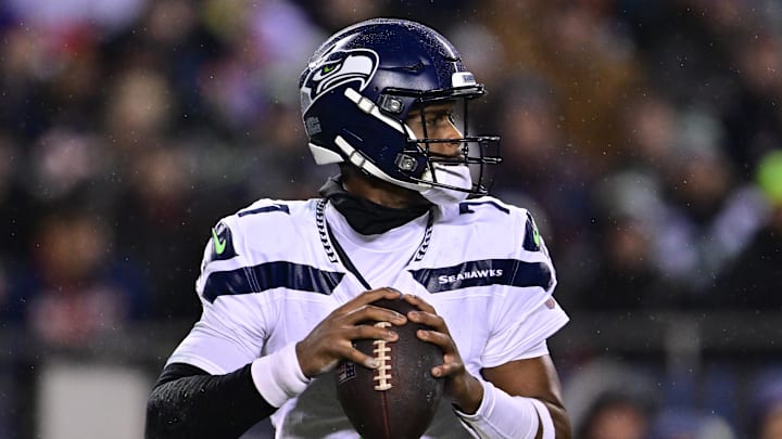 Dec 26, 2024; Chicago, Illinois, USA; Seattle Seahawks quarterback Geno Smith (7) looks to pass against the Chicago Bears during the second quarter at Soldier Field. Mandatory Credit: Daniel Bartel-Imagn Images