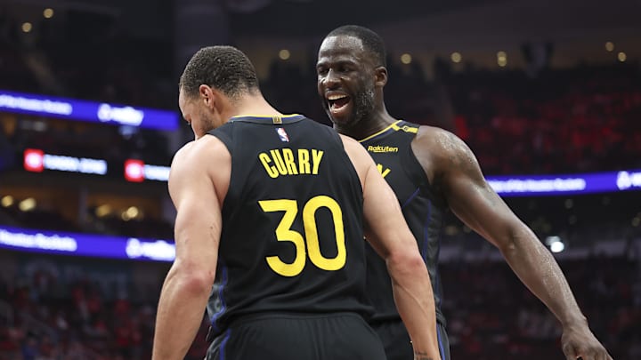 May 4, 2025; Houston, Texas, USA; Golden State Warriors forward Draymond Green (23) celebrates with guard Stephen Curry (30) during game seven of the first round for the 2025 NBA Playoffs against the Houston Rockets at Toyota Center. Mandatory Credit: Troy Taormina-Imagn Images