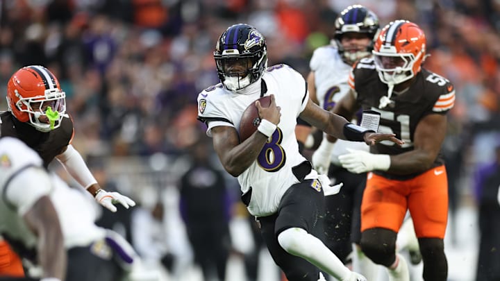 Nov 16, 2025; Cleveland, Ohio, USA; Baltimore Ravens quarterback Lamar Jackson (8) runs for a gain during the first quarter against the Cleveland Browns at Huntington Bank Field. Mandatory Credit: Scott Galvin-Imagn Images