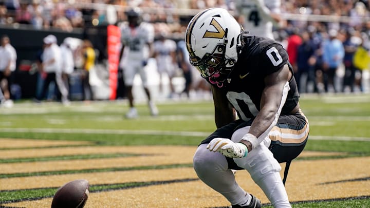 Vanderbilt wide receiver Junior Sherrill (0) celebrates touchdown against Utah State during the second quarter at FirstBank Stadium in Nashville, Tenn., Saturday, Sept. 27, 2025. Vanderbilt wide receiver Junior Sherrill (0) celebrates touchdown against Utah State during the second quarter at FirstBank Stadium in Nashville, Tenn., Saturday, Sept. 27, 2025.