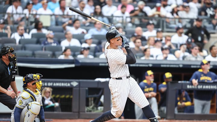 Mar 29, 2025; Bronx, New York, USA; New York Yankees right fielder Aaron Judge (99) hits a two run home in the fourth inning against the Milwaukee Brewers at Yankee Stadium. Mandatory Credit: Wendell Cruz-Imagn Images