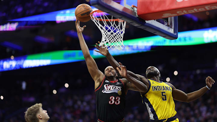 Dec 12, 2025; Philadelphia, Pennsylvania, USA; Philadelphia 76ers forward Jabari Walker (33) drives for a shot attempt against Indiana Pacers forward Jarace Walker (5) during the first quarter at Xfinity Mobile Arena. Mandatory Credit: Bill Streicher-Imagn Images