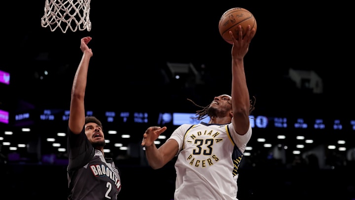 Dec 4, 2024; Brooklyn, New York, USA; Indiana Pacers center Myles Turner (33) drives to the basket against Brooklyn Nets forward Cameron Johnson (2) during the second quarter at Barclays Center. Mandatory Credit: Brad Penner-Imagn Images Dec 4, 2024; Brooklyn, New York, USA; Indiana Pacers center Myles Turner (33) drives to the basket against Brooklyn Nets forward Cameron Johnson (2) during the second quarter at Barclays Center. Mandatory Credit: Brad Penner-Imagn Images