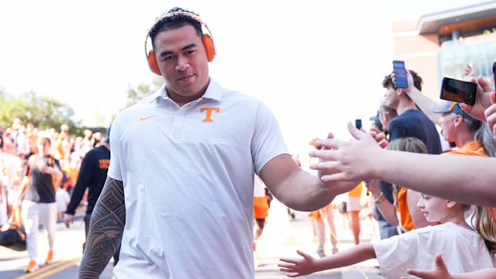Tennessee defensive lineman Jaxson Moi (51) high-fives fans during the Vol Walk before a NCAA football game between Tennessee and UAB at Neyland Stadium in Knoxville, Tenn., September 20, 2025. Tennessee defensive lineman Jaxson Moi (51) high-fives fans during the Vol Walk before a NCAA football game between Tennessee and UAB at Neyland Stadium in Knoxville, Tenn., September 20, 2025.