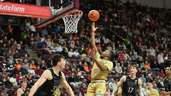 Jan 27, 2026; Blacksburg, Virginia, USA;  Georgia Tech Yellow Jackets guard Lamar Washington (1) lays the ball up during the first half at Cassell Coliseum. Mandatory Credit: Brian Bishop-Imagn Images