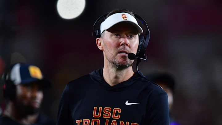 Southern California Trojans head coach Lincoln Riley watches game action.
