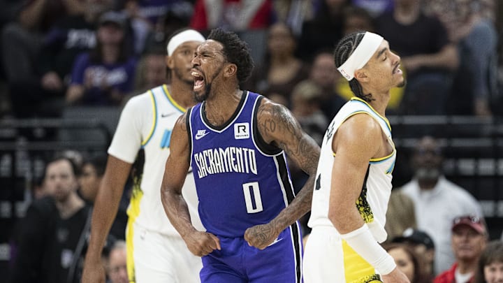 December 22, 2024; Sacramento, California, USA; Sacramento Kings guard Malik Monk (0) celebrates a defensive stop against Indiana Pacers guard Andrew Nembhard (2) during the second quarter at Golden 1 Center. Mandatory Credit: Kyle Terada-Imagn Images December 22, 2024; Sacramento, California, USA; Sacramento Kings guard Malik Monk (0) celebrates a defensive stop against Indiana Pacers guard Andrew Nembhard (2) during the second quarter at Golden 1 Center. Mandatory Credit: Kyle Terada-Imagn Images