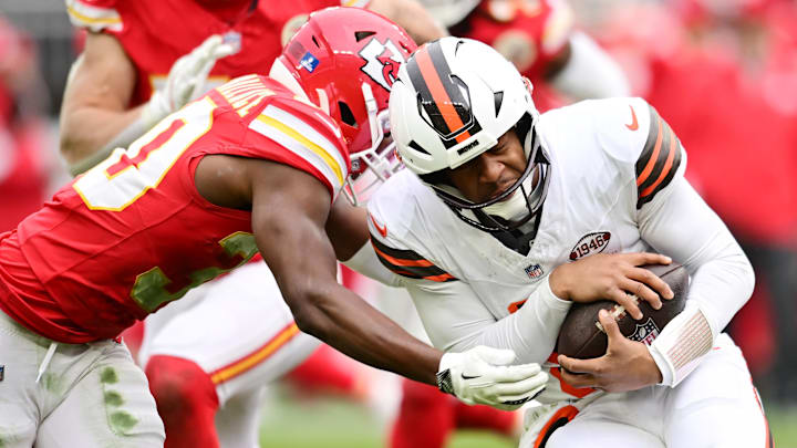 Kansas City Chiefs cornerback Christian Roland-Wallace (30) tackles Cleveland Browns quarterback Jameis Winston (5) during the second half at Huntington Bank Field.