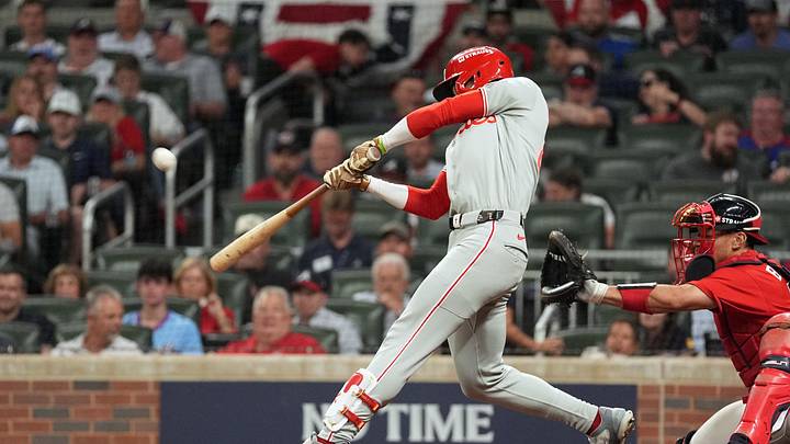 Oct 1, 2026; Cumberland, Georgia, USA; Philadelphia Phillies outfielder Derek Hill (49) hits a triple against Atlanta Braves pitcher Dylan Dodd (not pictured) during the eighth inning in game three of the Wildcard round for the 2026 MLB Playoffs at Truist Field. Mandatory Credit: Dale Zanine-Imagn Images Oct 1, 2026; Cumberland, Georgia, USA; Philadelphia Phillies outfielder Derek Hill (49) hits a triple against Atlanta Braves pitcher Dylan Dodd (not pictured) during the eighth inning in game three of the Wildcard round for the 2026 MLB Playoffs at Truist Field. Mandatory Credit: Dale Zanine-Imagn Images