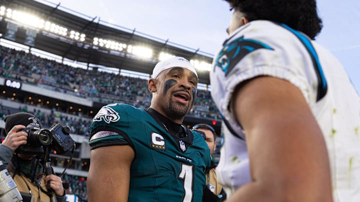 Dec 8, 2024; Philadelphia, Pennsylvania, USA;  Philadelphia Eagles quarterback Jalen Hurts (1) shakes hands with Carolina Panthers quarterback Bryce Young (9) after the game at Lincoln Financial Field. Mandatory Credit: Bill Streicher-Imagn Images