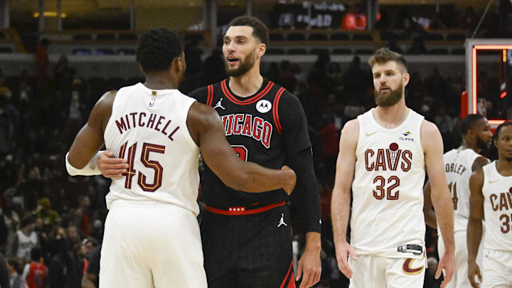 Chicago Bulls guard Zach LaVine (8) is hugged by Cleveland Cavaliers guard Donovan Mitchell (45) after the game at United Center. Mandatory Credit: Matt Marton-Imagn Images
