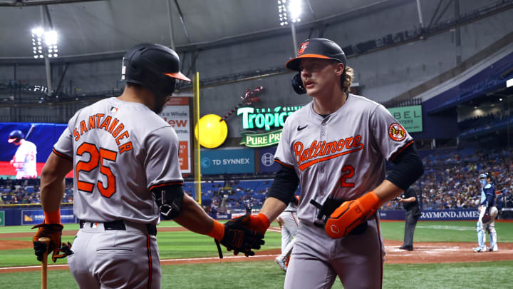 Jun 10, 2024; St. Petersburg, Florida, USA; Baltimore Orioles shortstop Gunnar Henderson (2) is congratulated by outfielder Anthony Santander (25).