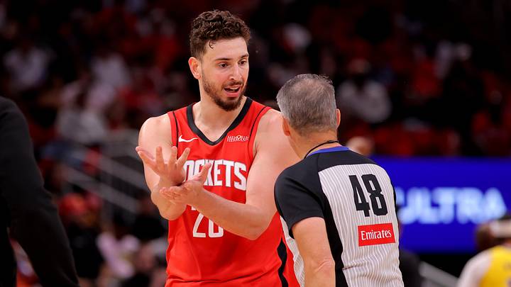 May 1, 2026; Houston, Texas, USA; Houston Rockets center Alperen Sengun (28) talks with NBA referee Scott Foster (48) during a timeout against the Los Angeles Lakers  during the second quarter of game six of the first round of the 2026 NBA Playoffs at Toyota Center. Mandatory Credit: Erik Williams-Imagn Images