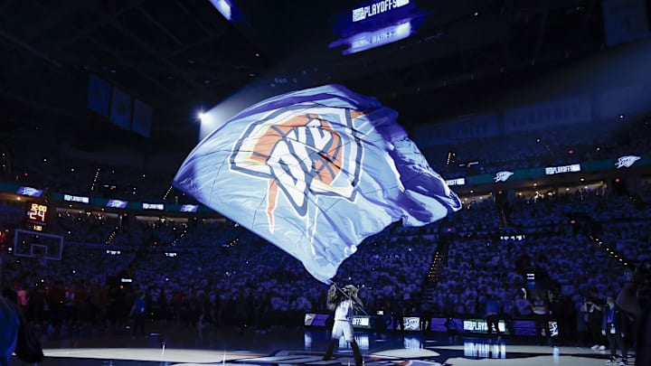 Apr 21, 2024; Oklahoma City, Oklahoma, USA; Oklahoma City Thunder mascot Rumble the Bison waves a giant flag before the start of game one of the first round for the 2024 NBA playoffs at Paycom Center. Mandatory Credit: Alonzo Adams-Imagn Images