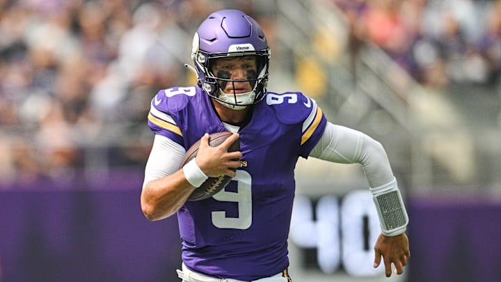 Aug 9, 2025; Minneapolis, Minnesota, USA; Minnesota Vikings quarterback J.J. McCarthy (9) scrambles for a gain against the Houston Texans during the first quarter at U.S. Bank Stadium. Mandatory Credit: Jeffrey Becker-Imagn Images