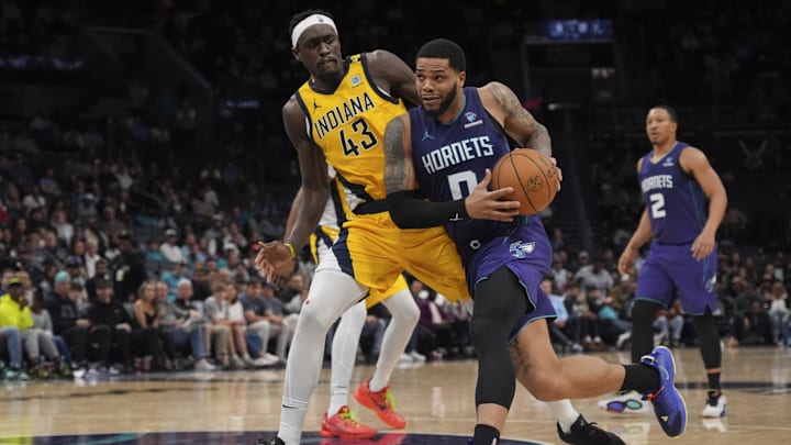 Feb 12, 2024; Charlotte, North Carolina, USA; Charlotte Hornets forward Miles Bridges (0) drives 