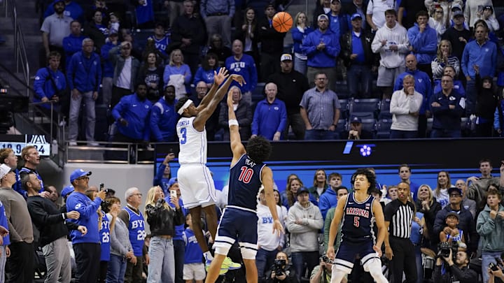Jan 26, 2026; Provo, Utah, USA; BYU Cougars forward AJ Dybantsa (3) takes a three point shot during the second half against the Arizona Wildcats at Marriott Center. Mandatory Credit: Aaron Baker-Imagn Images 