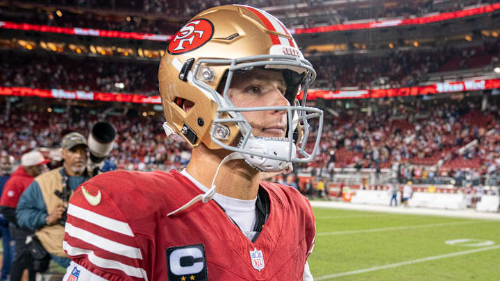 Oct 27, 2024; Santa Clara, California, USA; after the game San Francisco 49ers quarterback Brock Purdy (13) heads to the locker room against the Dallas Cowboys at Levi's Stadium. Mandatory Credit: Neville E. Guard-Imagn Images